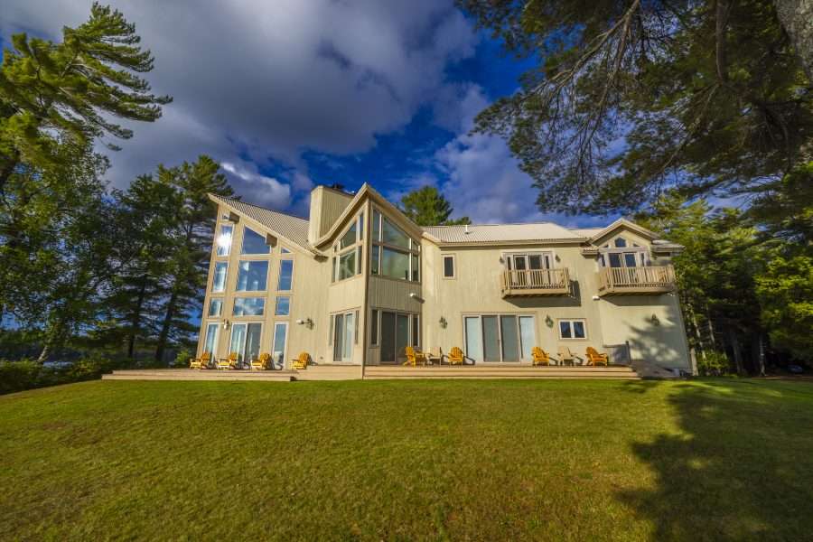 "Camp on a Point," the former summer residence of Marylou Whitney and John Hendrickson on Little Tupper Lake, is for sale