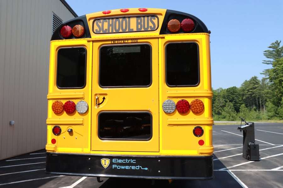 The back of an electric school bus in a parking lot