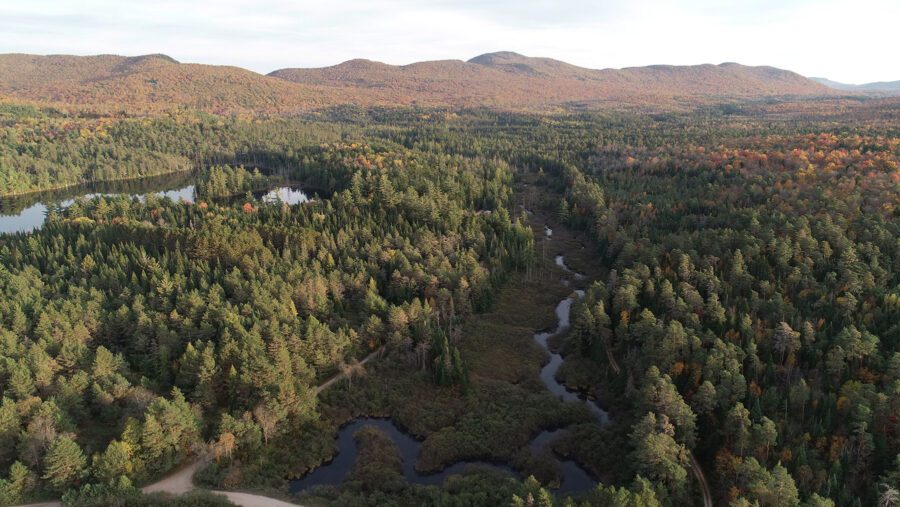 aerial shot of mountains in fall