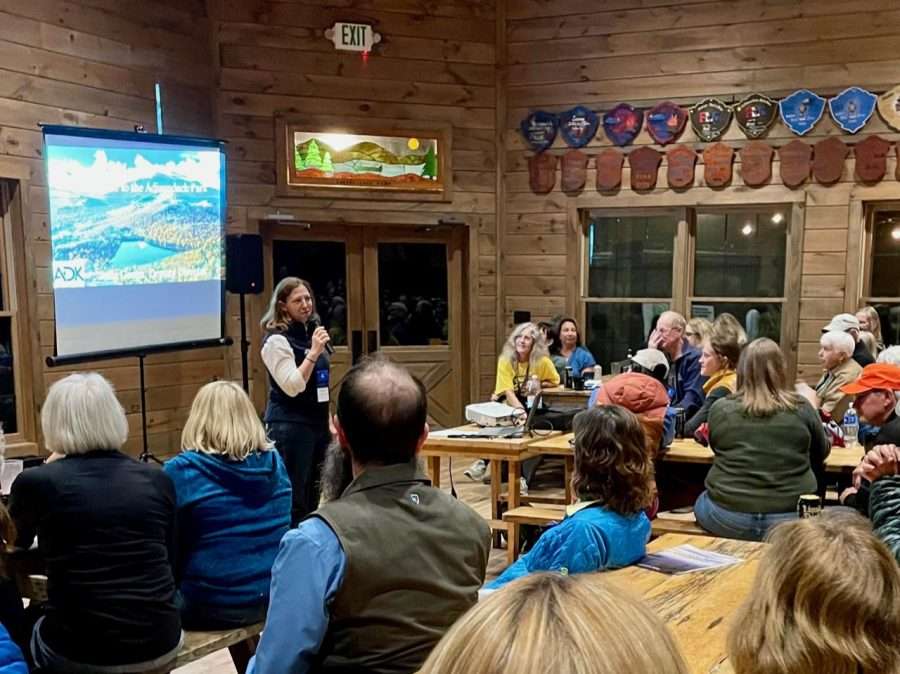 Julia Goren, deputy director of the Adirondack Mountain Club, speaks to a crowd at the annual North Country Trail Association celebration. Photo by Tim Rowland