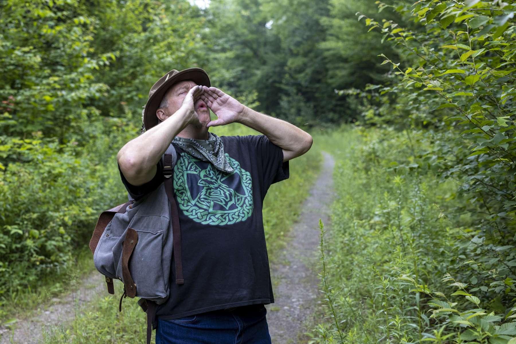 Wolf advocate Joe Butera performs a wolf howl in th northern Adirondacks. Photo by Mike Lynch