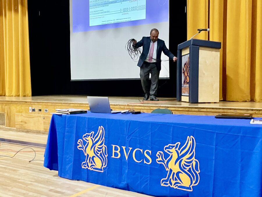 man on the stage at boquet valley school