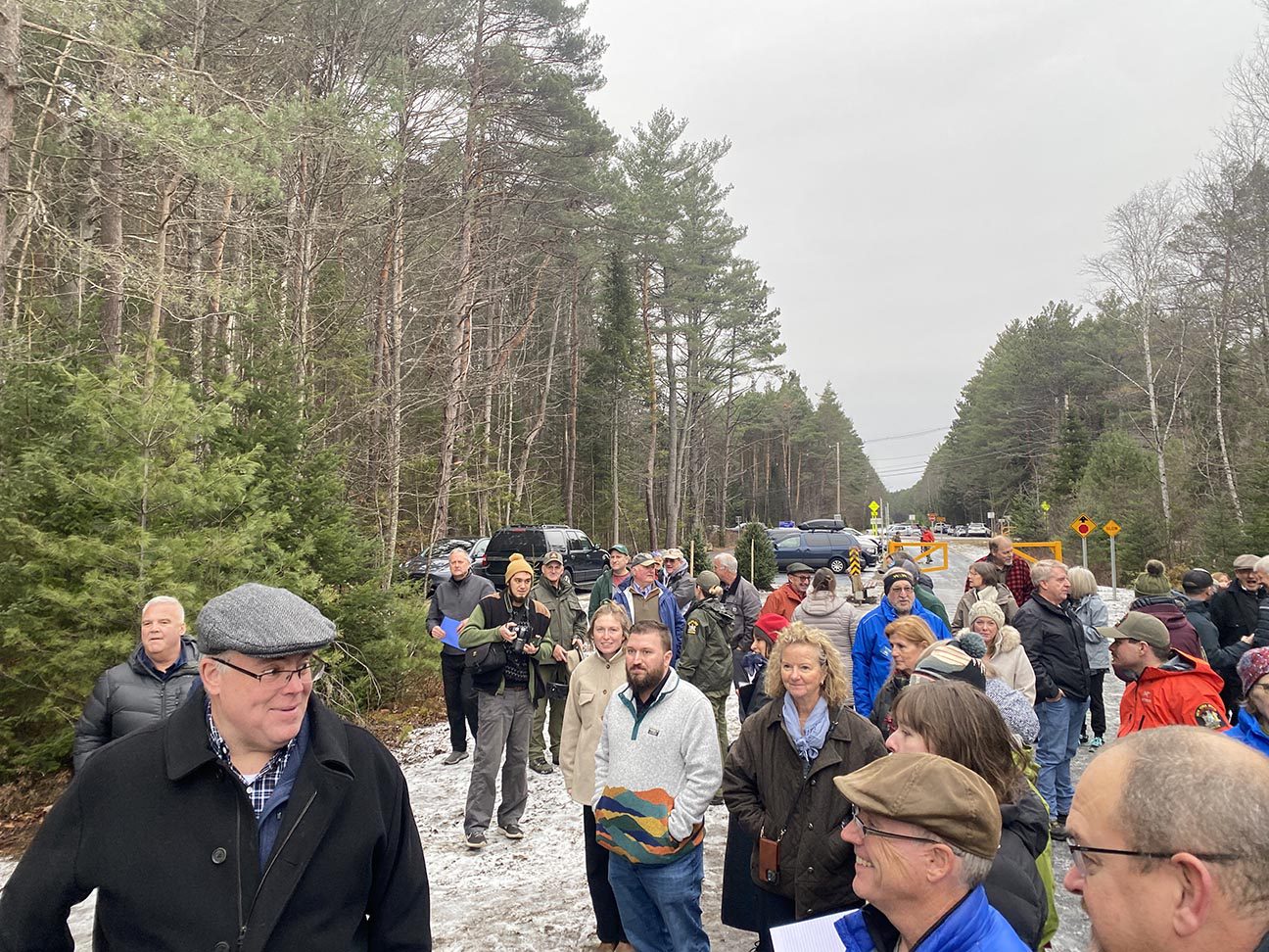 Several dozen people gathered for the opening Friday near Saranac Lake. Photo by Mike Lynch