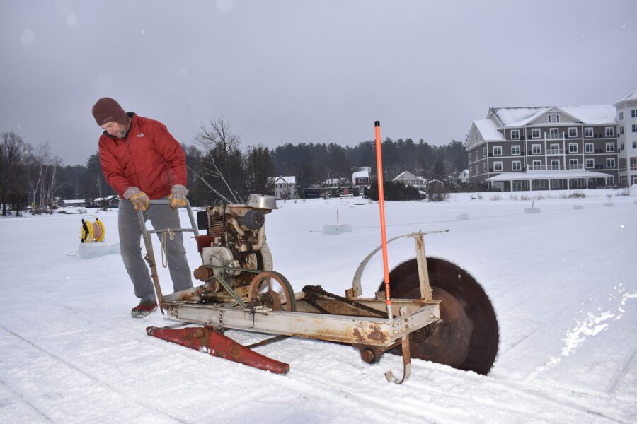 man with an antique saw