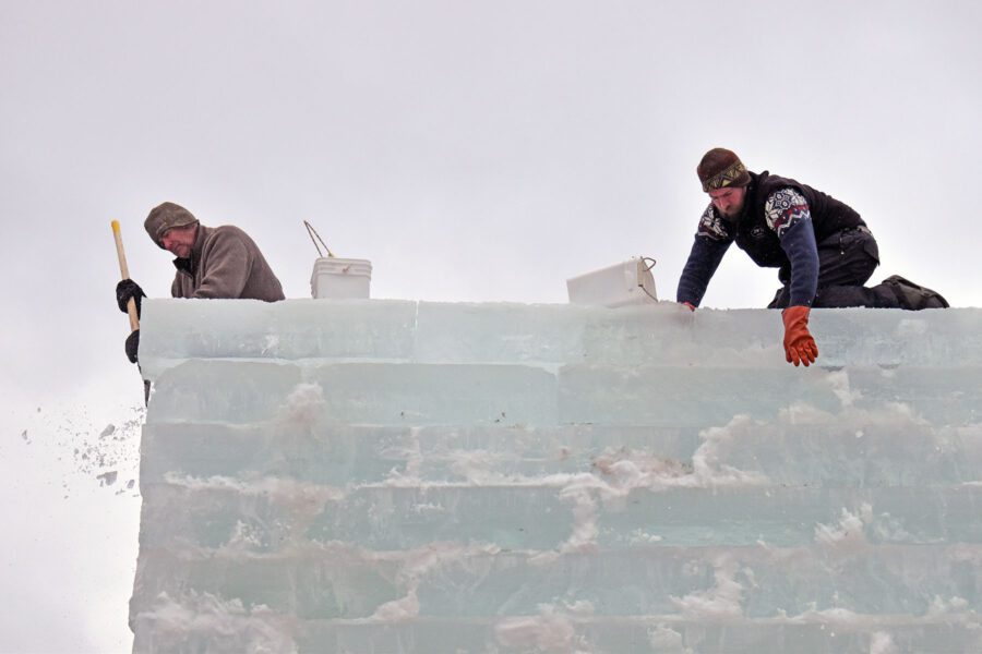 Two men on the top of the ice palace