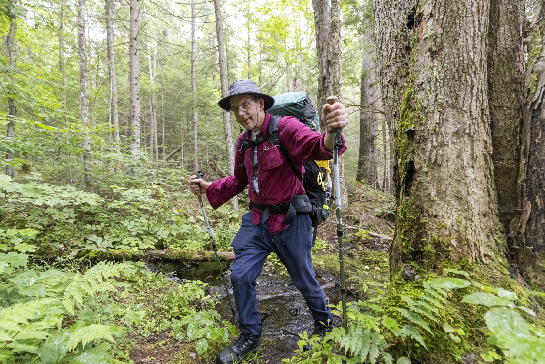 Jamieson Findlay hikes in Newcomb during the first leg of his trip from the Adirondack Park to Algonquin Park in 2023.