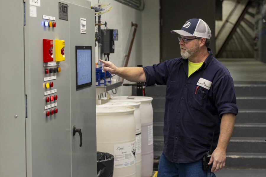 man at control panel