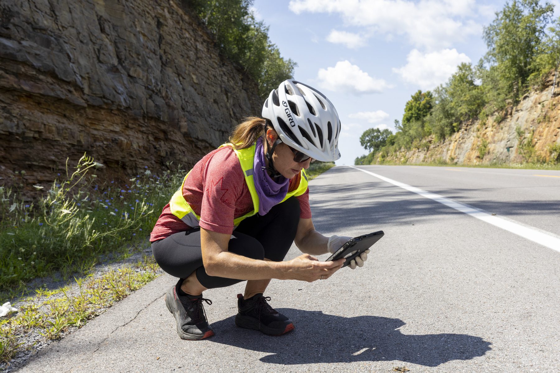 SUNY Potsdam Assistant Professor Kate Cleary documents roadkill on Route 12 in St. Lawrence County for a road ecology study. Photo by Mike Lynch