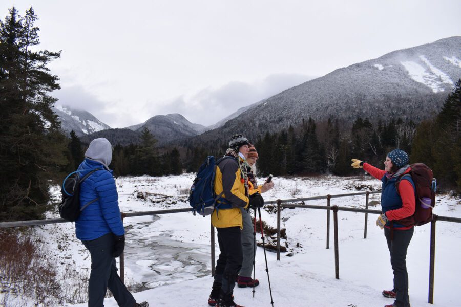 group on snowshoes at marcy dam