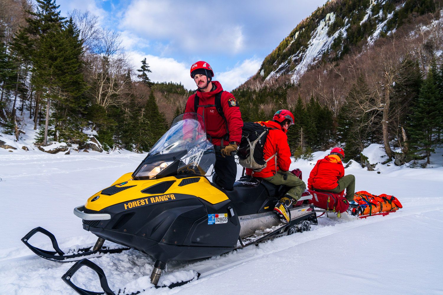 DEC rangers on snowmobiles