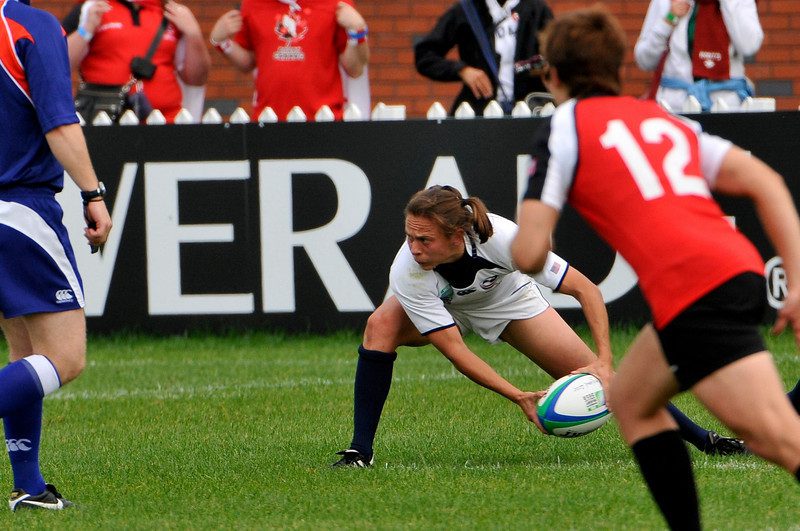 Claudia Braymer playing rugby