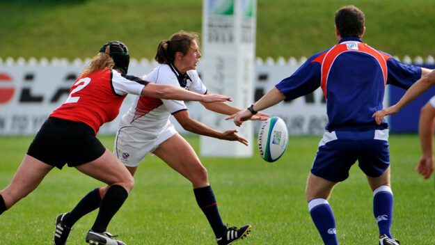Claudia Braymer playing rugby