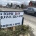 sign advertising eclipse glasses