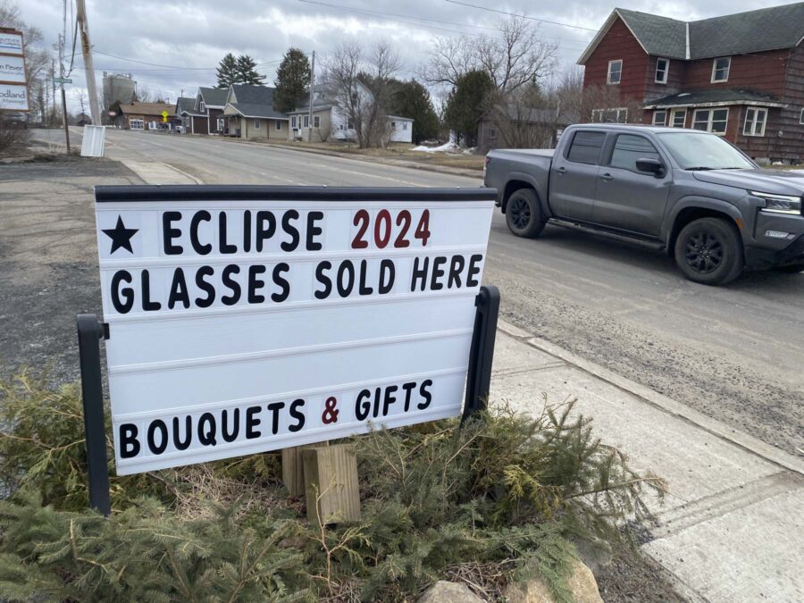 sign advertising eclipse glasses