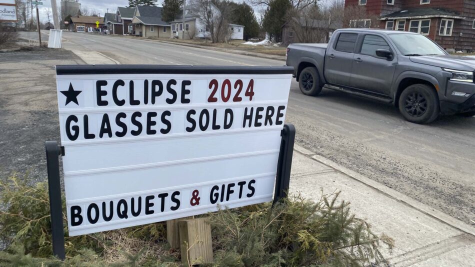 sign advertising eclipse glasses
