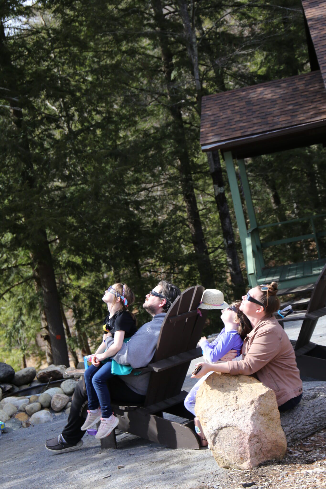 The Girl Scouts of Northeastern New York and their families watch the solar eclipse at Hidden Lake Camp in Lake Luzerne. Photo by Gwendolyn Craig