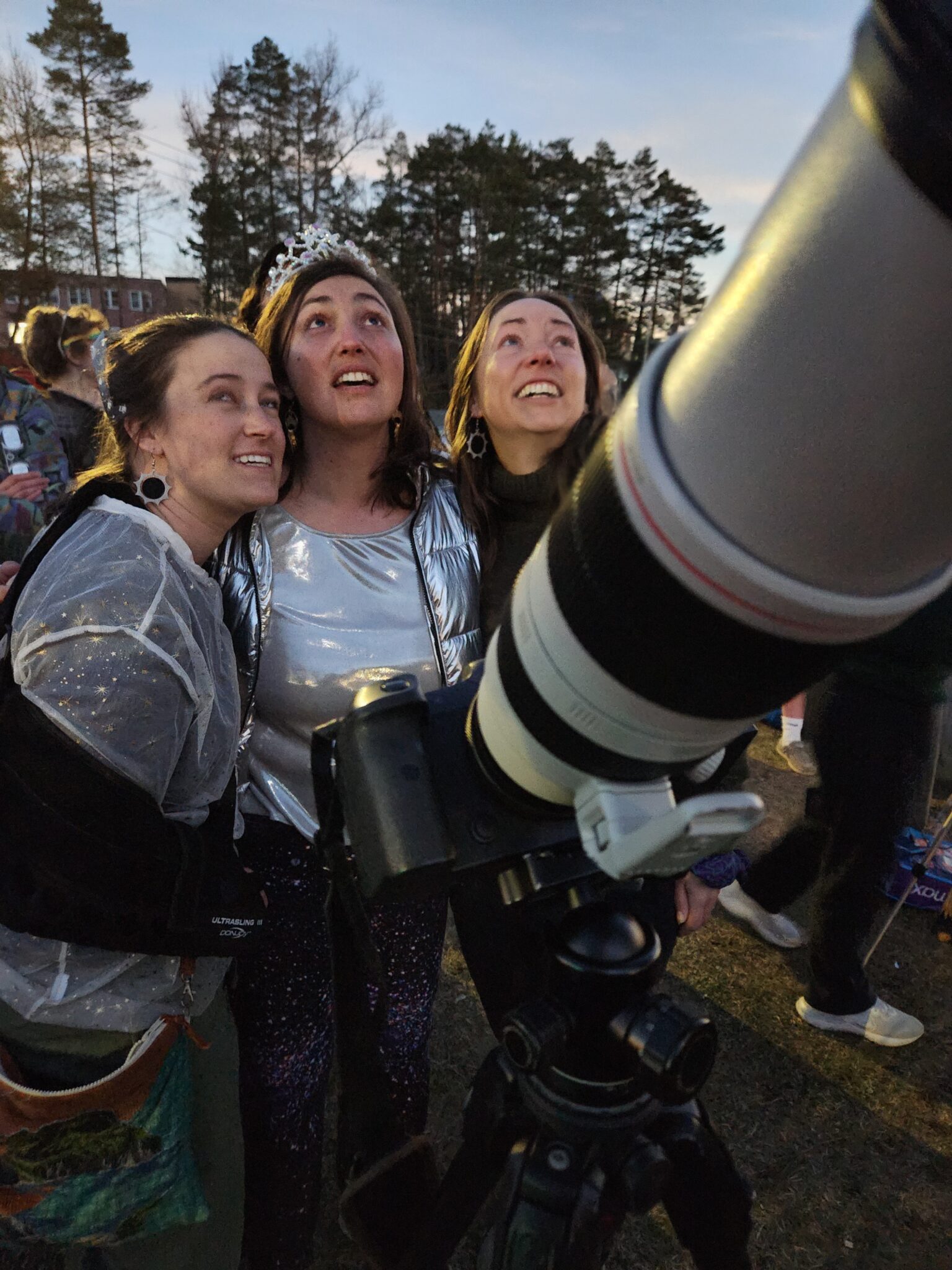 eclipse viewers with a telescope