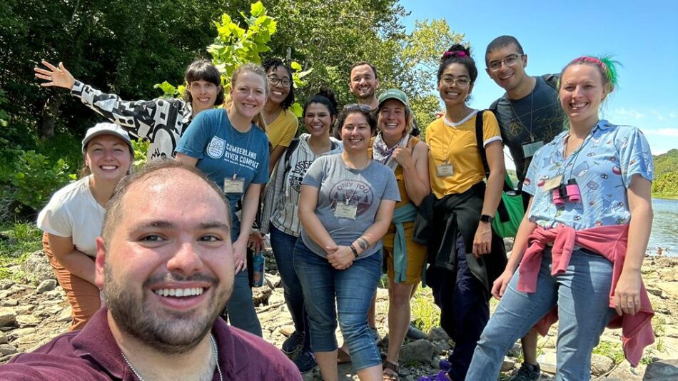 A group outside in the summer by the Potomac River