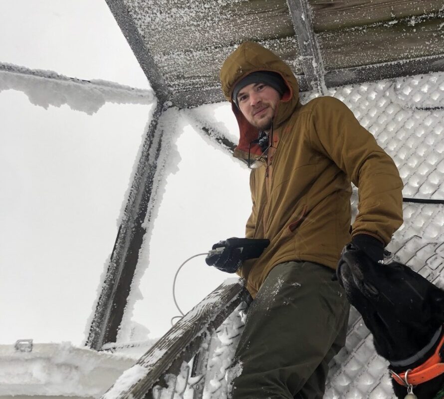 LJ Mills in a fire tower in winter