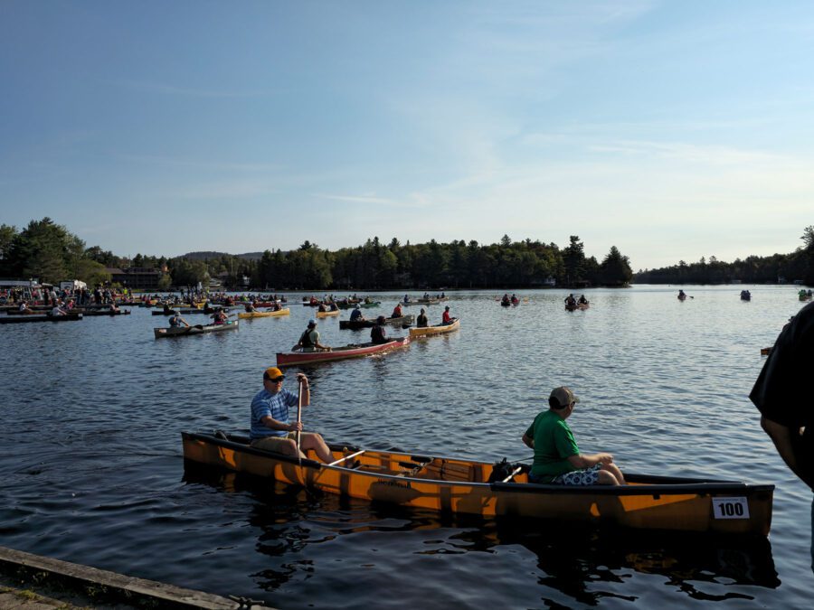 canoes on the water at the start of the 90 miler race