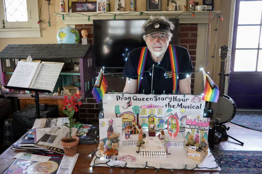 drag queen story hour writer with a replica of the stage