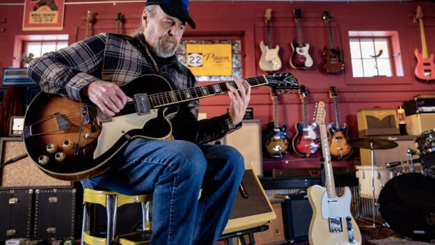 Ralph Lane, multi-instrumentalist and luthier from Crown Point, playing a 1959 Kay Barney Kessel, named after the American jazz guitarist, at 22 Pawn in Essex.