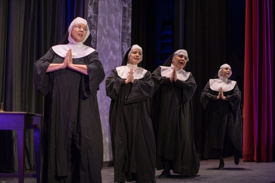 nuns on a stage