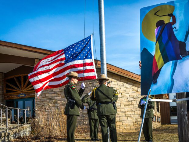 a flag ceremony for deceased forest ranger robbi mecus