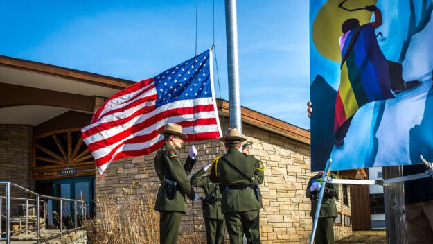 a flag ceremony for deceased forest ranger robbi mecus