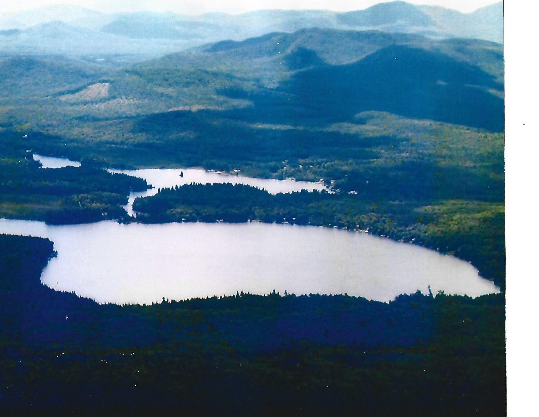 aerial shot of a lake in the Adirondacks that is a possible site for ProcellaCOR