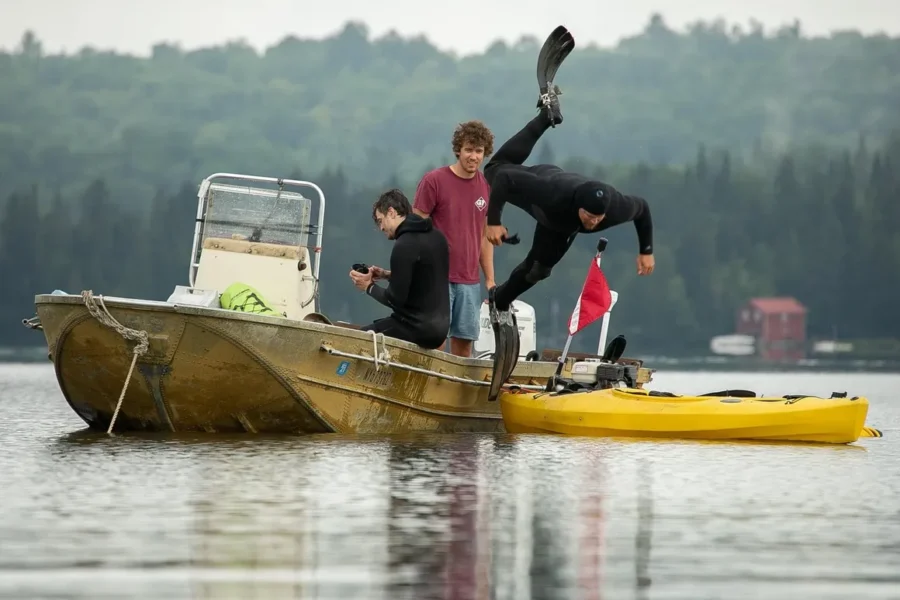 Contracted dive crews working on removing invasive milfoil from Mountain View Lake. 