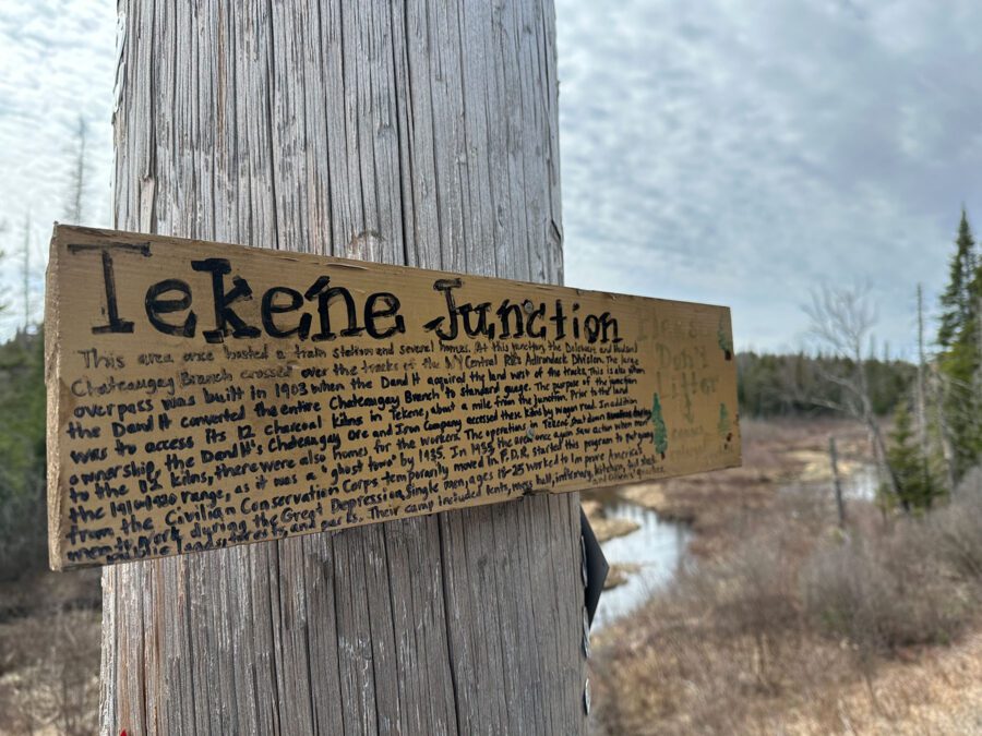 A homemade sign tells the story of Tekene Junction
