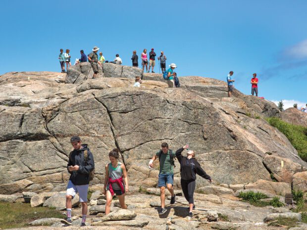 Hikers on mountaintop