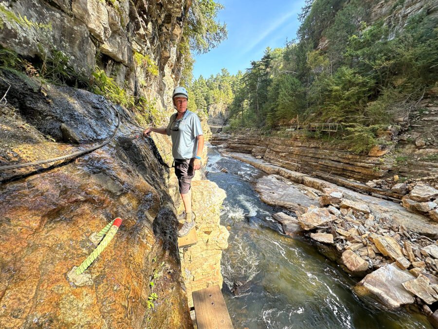 Guide Chuck Fries on the Ausable Chasm via ferrata. He’s clipped into the cable visible on the left. 