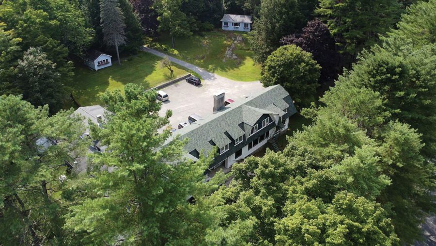 Aerial view of buildings in woods