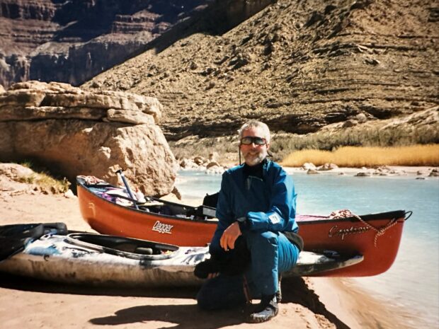 man with a canoe in the Grand Canyon