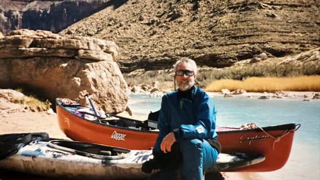 man with a canoe in the Grand Canyon