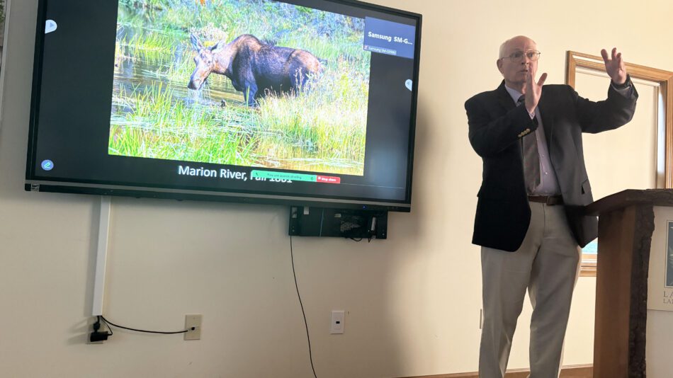 Al Hicks talks about climate change and wildlife at the Lake George Land Conservancy office in Bolton Landing. Photo by Mike Lynch