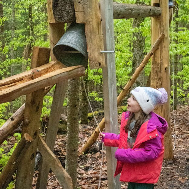 girl playing with ball run at the wild center