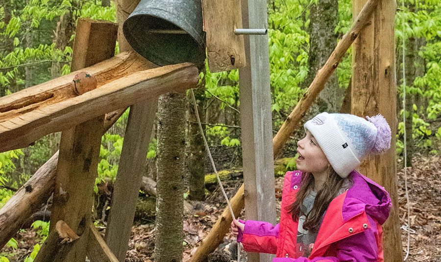 girl playing with ball run at the wild center