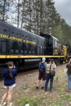 Passengers looking at train