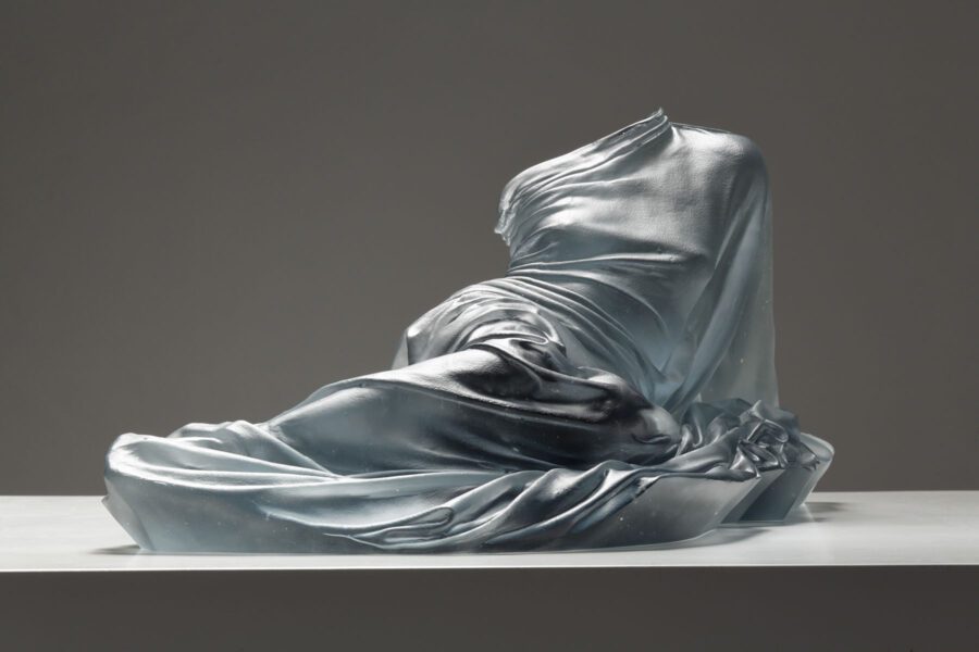 Karen LaMonte (American, born 1967), Reclining Lucent 3, 2022. Cast glass, 51.5 x 153 x 65.5 cm. © Karen LaMonte. Photo: Martin Polak.
