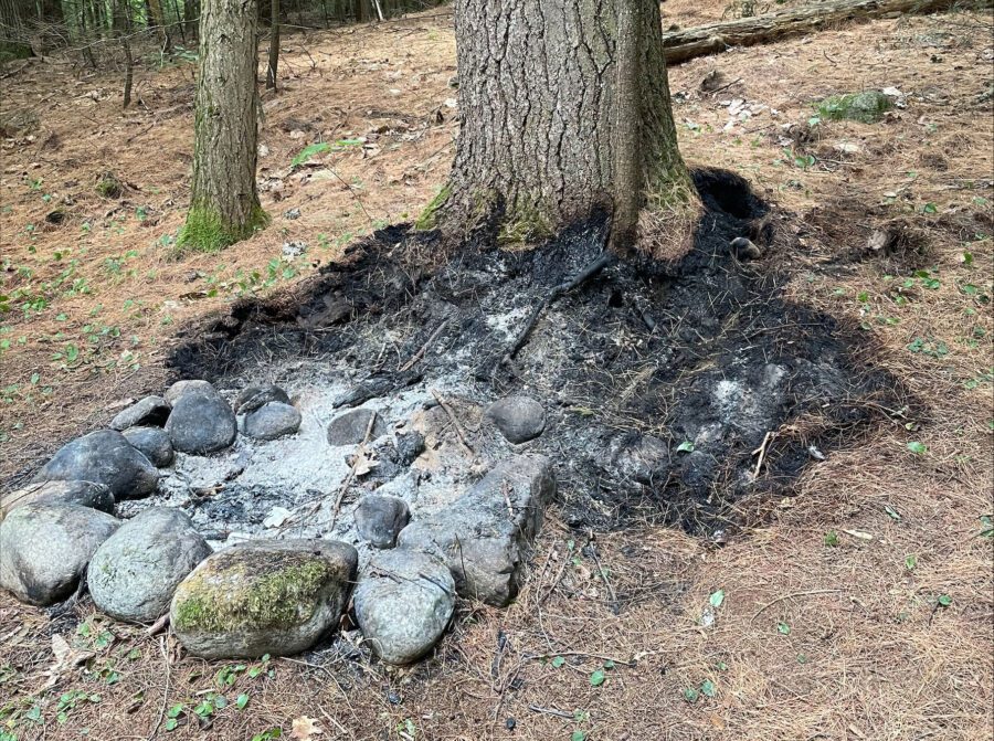 Remains of unattended fire at Split Rock Falls. DEC photo