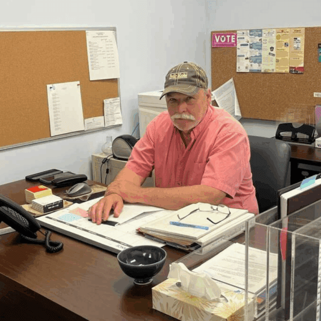Marty Miller, the town supervisor of Potsdam, sits at his desk at Town Hall. Potsdam’s population declined by 1,523 residents between 2010 and 2024. Courtesy of Marty Miller