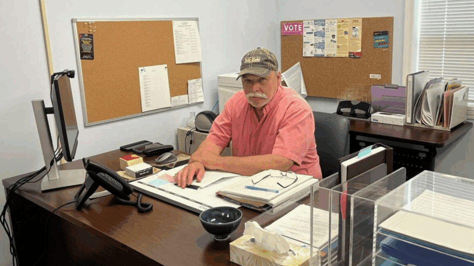 Marty Miller, the town supervisor of Potsdam, sits at his desk at Town Hall. Potsdam’s population declined by 1,523 residents between 2010 and 2024. Courtesy of Marty Miller