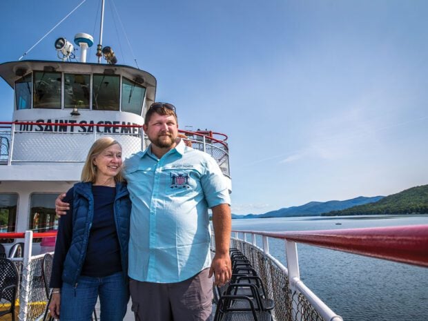 Luke Dow with his mother Patricia in Lake George NY at their Lake George Steamboat Company, a generational family business. photo by Nancie Battaglia