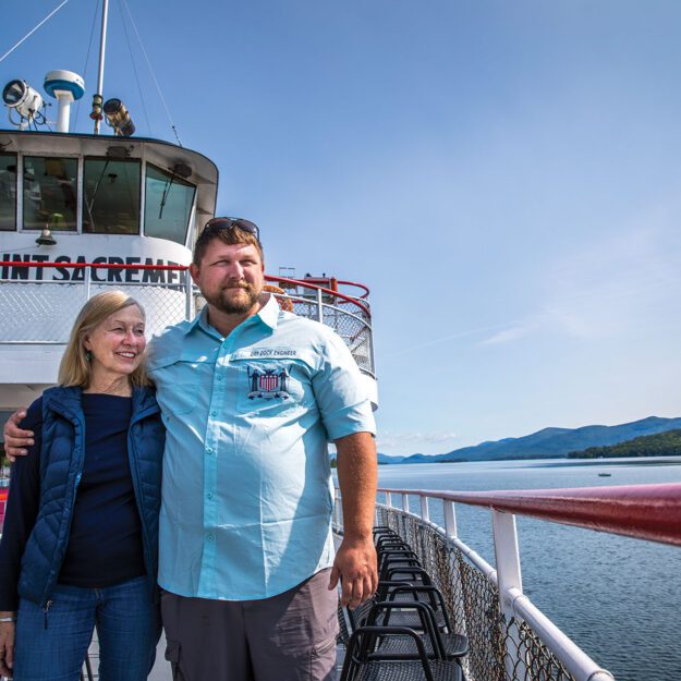 Luke Dow with his mother Patricia in Lake George NY at their Lake George Steamboat Company, a generational family business. photo by Nancie Battaglia