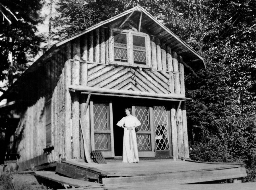 “Whipsaw” cottage was originally built as boathouse and guides quarters for the L.W. Brown camp. Photo was taken in 1935, shortly after it was acquired by E.J. Martin and converted to a “cottage”. The lady, named on the back to the photo, was on her honeymoon.
