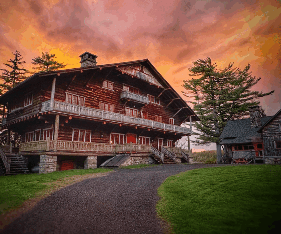Great Camp Sagamore at sunset. Photo by Cari Ray; courtesy of Sagamore Institute of the Adirondacks. 