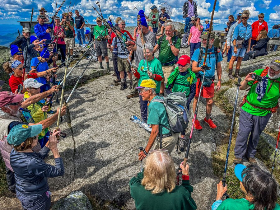 a group of 46er hikers celebrating gary koch